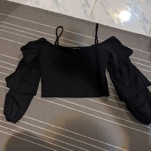 Black off the shoulder top with frill sleeves